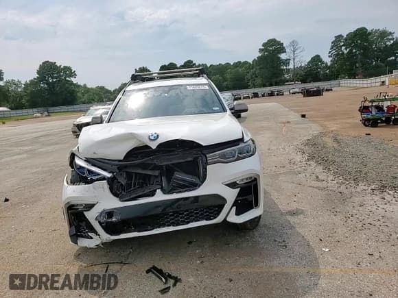 ✅ 2020 BMW X7 M50i • VIN: 5UXCX6C05L9C38130 • Lot: 71829275. Listed on Copart with 86,202 mi. Free auction sales archive from the USA and detailed vehicle history report at DreamBid. Image 14.
