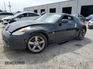 ✅ 2009 Nissan 370Z Touring • VIN: JN1AZ44E69M407868 • Лот: 60229915. Опубликован ранее на Copart с пробегом Не указан. Бесплатный доступ к архиву аукционных продаж из США и подробный отчёт об истории автомобиля на DreamBid. Изображение 1.