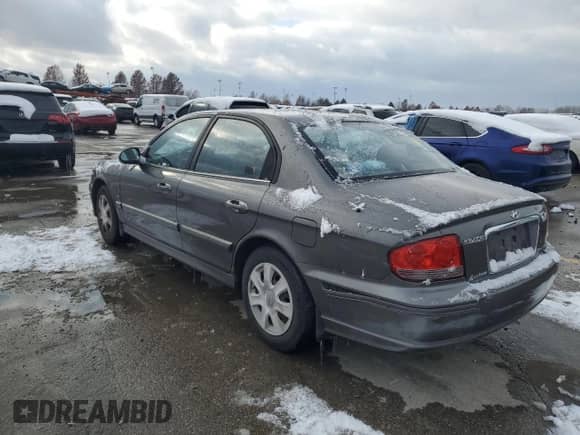 2002 Hyundai Sonata с VIN KMHWF25S52A703469, выставлен на аукционе Copart как лот 82907824 с пробегом 80 960 миль миль и Чистый • Clean title. История ставок и продаж доступна на DreamBid. Изображение 2.