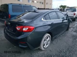 ✅ 2018 Chevrolet Cruze LT • VIN: 1G1BE5SM0J7201390 • Lot: 68055412. Listed on Copart with 62,215 mi. Free auction sales archive from the USA and detailed vehicle history report at DreamBid. Image 3.