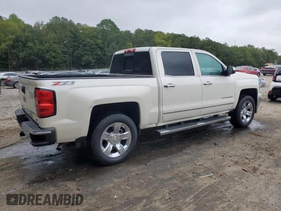 ✅ 2015 Chevrolet Silverado 1500 LTZ • VIN: 3GCUKSECXFG311126 • Lot: 84416175. Listed on Copart with 121,606 mi. Free auction sales archive from the USA and detailed vehicle history report at DreamBid. Image 3.