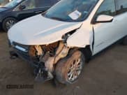 ✅ 2020 Chevrolet Equinox LT • VIN: 2GNAXJEV0L6164006 • Lot: 43519260. Listed on IAAI with 60,174 mi. Free auction sales archive from the USA and detailed vehicle history report at DreamBid. Image 18.