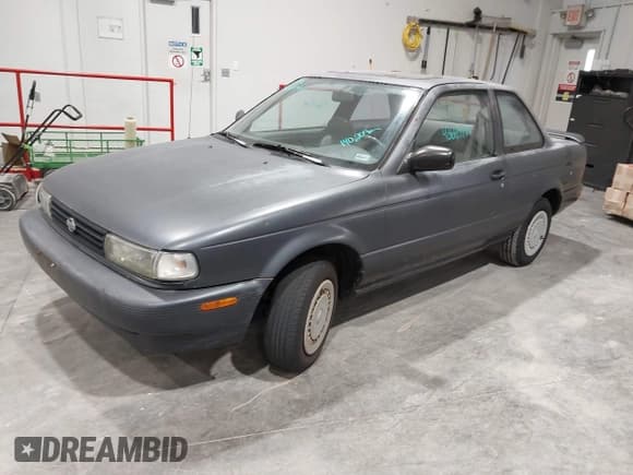 ✅ 1991 Nissan Sentra E • VIN: 1N4EB32A2MC701771 • Lot: 43669744. Listed on IAAI with 140,209 mi. Free auction sales archive from the USA and detailed vehicle history report at DreamBid. Image 2.
