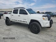 ✅ 2011 Toyota Tacoma PreRunner • VIN: 3TMJU4GN5BM110818 • Lot: 81706355. Listed on Copart with 217,883 mi. Free auction sales archive from the USA and detailed vehicle history report at DreamBid. Image 4.