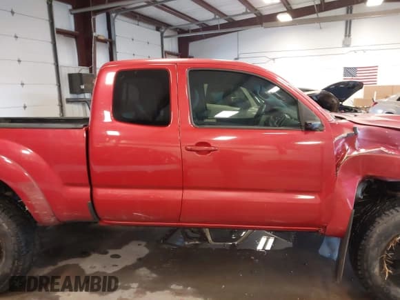 ✅ 2015 Toyota Tacoma • VIN: 5TFUU4EN0FX111701 • Лот: 41275615. Опубликован ранее на IAAI с пробегом 128 255 миль. Бесплатный доступ к архиву аукционных продаж из США и подробный отчёт об истории автомобиля на DreamBid. Изображение 14.