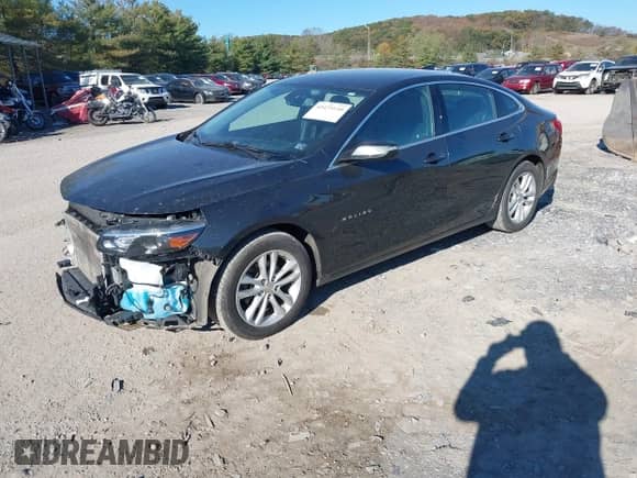 2018 Chevrolet Malibu LT z VIN 1G1ZD5ST0JF244643, wystawiony jako IAAI lot #43475110 z przebiegiem 137 932 mil mil oraz . Historia ofert i sprzedaży dostępna na DreamBid. Obrazek 2.