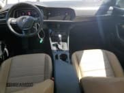 ✅ 2021 Volkswagen Jetta SEL • VIN: 3VWE57BU5MM013374 • Лот: 65150905. Опубликован ранее на Copart с пробегом 50 969 миль. Бесплатный доступ к архиву аукционных продаж из США и подробный отчёт об истории автомобиля на DreamBid. Изображение 8.