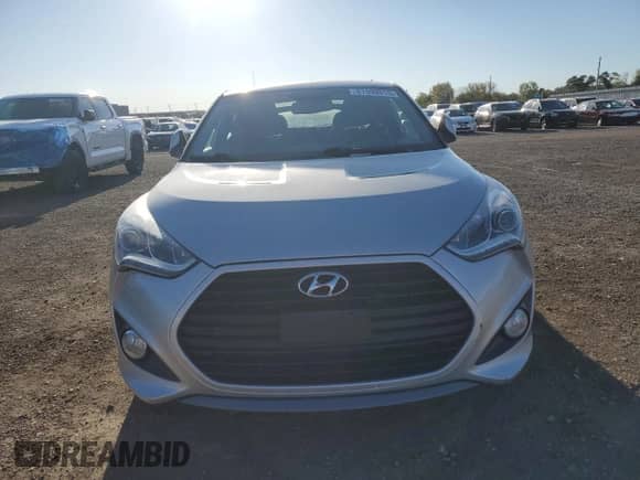 ✅ 2014 Hyundai Veloster Turbo • VIN: KMHTC6AE6EU184759 • Lot: 87099815. Wystawiony na Copart z przebiegiem 37 274 mil. Bezpłatny archiwum sprzedaży aukcyjnych z USA i szczegółowy raport historii pojazdu na DreamBid. Zdjęcie 5.