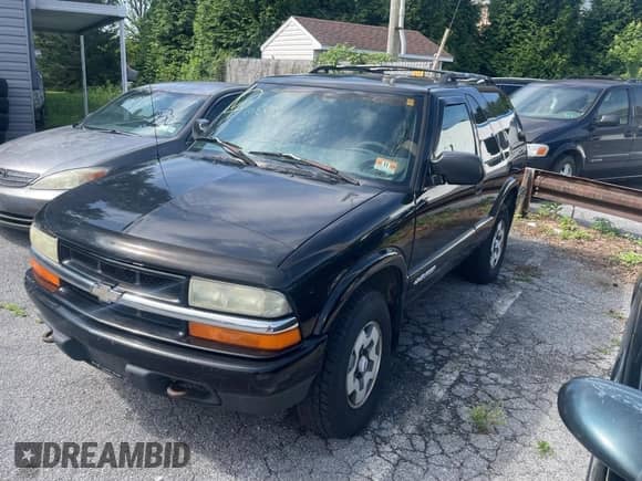 2003 Chevrolet Blazer LS z VIN 1GNCT18X83K175026, wystawiony jako Copart lot #64382535 z przebiegiem 200 297 mil mil oraz Czysty tytuł • Clean title. Historia ofert i sprzedaży dostępna na DreamBid. Obrazek 2.