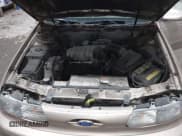 ✅ 1993 Ford Taurus GL • VIN: 1FALP52U1PG153869 • Lot: 43383973. Wystawiony na IAAI z przebiegiem 52 208 mil. Bezpłatny archiwum sprzedaży aukcyjnych z USA i szczegółowy raport historii pojazdu na DreamBid. Zdjęcie 10.