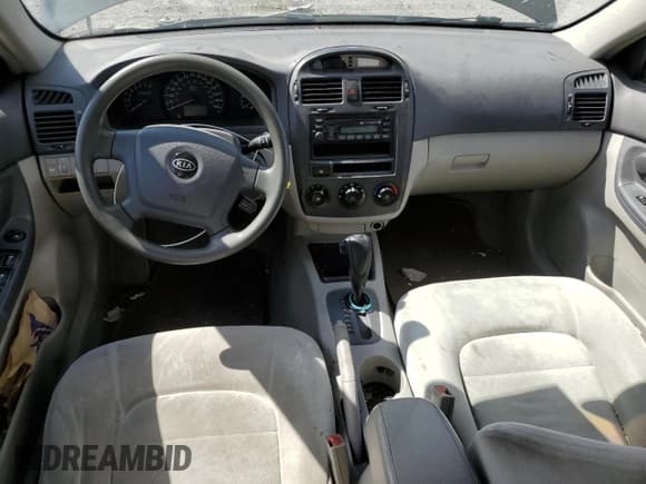 ✅ 2004 Kia Spectra LX • VIN: KNAFE121345009532 • Lot: 68564334. Wystawiony na Copart z przebiegiem 159 066 mil. Bezpłatny archiwum sprzedaży aukcyjnych z USA i szczegółowy raport historii pojazdu na DreamBid. Zdjęcie 8.