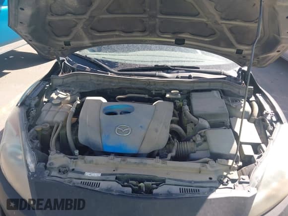 ✅ 2012 Mazda 3 i Touring • VIN: JM1BL1L78C1675611 • Lot: 42398294. Listed on IAAI with 164,809 mi. Free auction sales archive from the USA and detailed vehicle history report at DreamBid. Image 10.