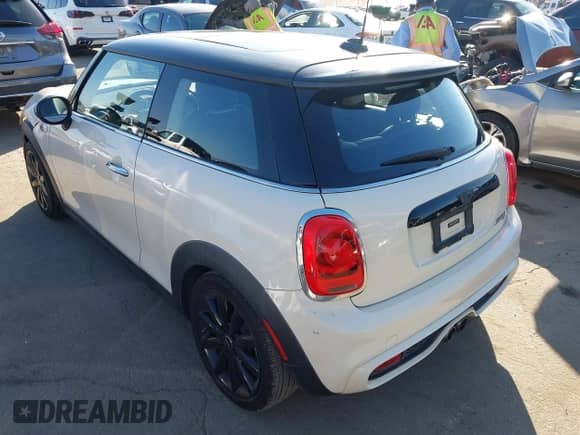 2017 MINI Hardtop Cooper S with VIN WMWXP7C57H3B93462, listed as a IAAI auction lot 43517920 with 56,050 mi miles and . Bid and sale history available at DreamBid. Image 3.