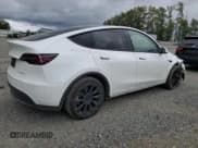 ✅ 2023 Tesla Model Y Long Range • VIN: 7SAYGDEE3PF751019 • Лот: 57972885. Опубликован ранее на Copart с пробегом 24 591 миль. Бесплатный доступ к архиву аукционных продаж из США и подробный отчёт об истории автомобиля на DreamBid. Изображение 3.