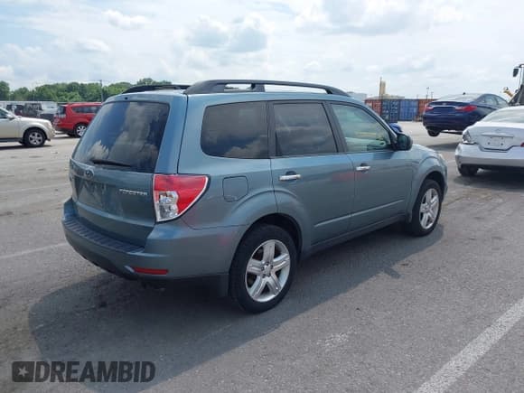 ✅ 2009 Subaru Forester X • VIN: JF2SH63609H766458 • Lot: 42621929. Listed on IAAI with 152,235 mi. Free auction sales archive from the USA and detailed vehicle history report at DreamBid. Image 4.