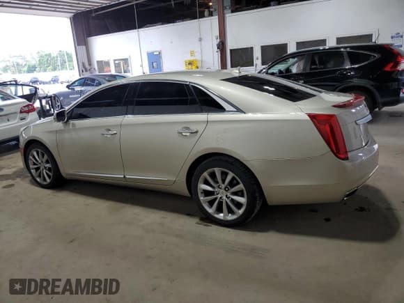 ✅ 2014 Cadillac XTS Luxury • VIN: 2G61M5S34E9151176 • Лот: 71496625. Опубликован ранее на Copart с пробегом 126 857 миль. Бесплатный доступ к архиву аукционных продаж из США и подробный отчёт об истории автомобиля на DreamBid. Изображение 2.