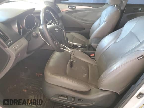 2011 Hyundai Sonata Hybrid with VIN KMHEC4A41BA002810, listed as a Copart auction lot 86480695 with 131,183 mi miles and Salvage title. Bid and sale history available at DreamBid. Image 7.