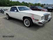 ✅ 1984 Cadillac Eldorado Biarritz • VIN: 1G6AL6787EE627169 • Lot: 64668625. Wystawiony na Copart z przebiegiem 34 245 mil. Bezpłatny archiwum sprzedaży aukcyjnych z USA i szczegółowy raport historii pojazdu na DreamBid. Zdjęcie 13.