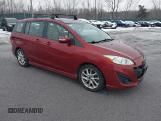 ✅ 2013 Mazda 5 Grand Touring • VIN: JM1CW2DL0D0159358 • Lot: 43814485. Listed on IAAI with 131,152 mi. Free auction sales archive from the USA and detailed vehicle history report at DreamBid. Image 1.