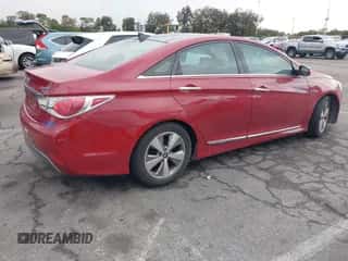 2012 Hyundai Sonata Hybrid z VIN KMHEC4A47CA044013, wystawiony jako IAAI lot #43455525 z przebiegiem 181 387 mil mil oraz . Historia ofert i sprzedaży dostępna na DreamBid. Obrazek 4.