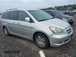 ✅ 2006 Honda Odyssey EX-L • VIN: 5FNRL38776B009502 • Lot: 43200978. Listed on IAAI with Not provided. Free auction sales archive from the USA and detailed vehicle history report at DreamBid. Image 1.