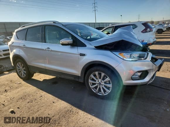 ✅ 2018 Ford Escape Titanium • VIN: 1FMCU9J95JUC89353 • Lot: 81991015. Listed on Copart with Not provided. Free auction sales archive from the USA and detailed vehicle history report at DreamBid. Image 4.