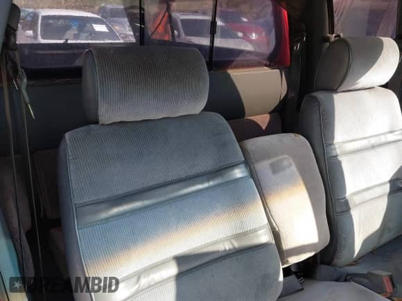 1991 Dodge Dakota z VIN 1B7FL23X5MS335433, wystawiony jako IAAI lot #41149799 z przebiegiem Nie podano mil oraz . Historia ofert i sprzedaży dostępna na DreamBid. Obrazek 8.