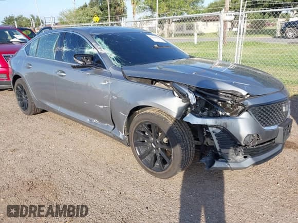 ✅ 2023 Cadillac CT5 Luxury • VIN: 1G6DW5RK8P0137606 • Лот: 42605633. Опубликован ранее на IAAI с пробегом 58 207 миль. Бесплатный доступ к архиву аукционных продаж из США и подробный отчёт об истории автомобиля на DreamBid. Изображение 1.