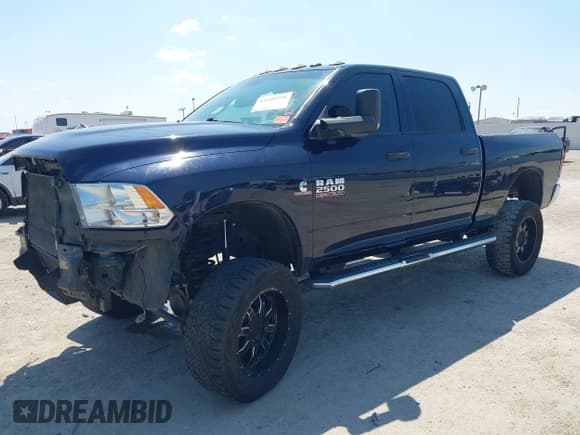 ✅ 2018 Ram 2500 Tradesman • VIN: 3C6UR5CLXJG381757 • Lot: 43205290. Listed on IAAI with 181,079 mi. Free auction sales archive from the USA and detailed vehicle history report at DreamBid. Image 2.