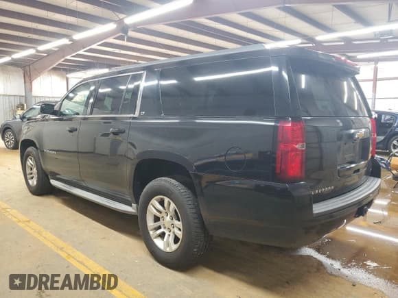 ✅ 2015 Chevrolet Suburban LT • VIN: 1GNSCJKCXFR568720 • Лот: 90636855. Опубликован ранее на Copart с пробегом 133 111 миль. Бесплатный доступ к архиву аукционных продаж из США и подробный отчёт об истории автомобиля на DreamBid. Изображение 2.