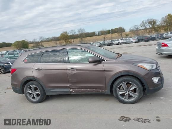 ✅ 2015 Hyundai Santa Fe GLS • VIN: KM8SMDHF4FU103061 • Лот: 43544205. Опубликован ранее на IAAI с пробегом 106 991 миль. Бесплатный доступ к архиву аукционных продаж из США и подробный отчёт об истории автомобиля на DreamBid. Изображение 14.