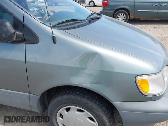 ✅ 2000 Toyota Sienna CE • VIN: 4T3ZF19C0YU210825 • Lot: 42700730. Listed on IAAI with 169,766 mi. Free auction sales archive from the USA and detailed vehicle history report at DreamBid. Image 6.