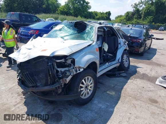 2010 Mercury Mariner Premier с VIN 4M2CN9HG3AKJ27247, выставлен на аукционе IAAI как лот 43011250 с пробегом 96 157 миль миль и . История ставок и продаж доступна на DreamBid. Изображение 6.