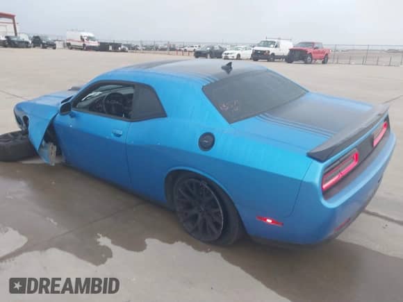 2015 Dodge Challenger R/T Plus with VIN 2C3CDZBT4FH850221, listed as a IAAI auction lot 41530700 with 86,226 mi miles and . Bid and sale history available at DreamBid. Image 3.