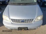 ✅ 2003 Ford Windstar • VIN: 2FMZA50483BB26612 • Lot: 43916615. Listed on IAAI with 1,399,405 mi. Free auction sales archive from the USA and detailed vehicle history report at DreamBid. Image 6.