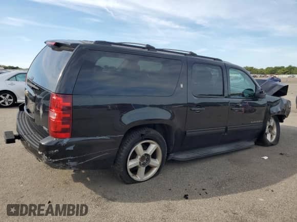 2010 Chevrolet Suburban LT z VIN 1GNUKJE31AR198192, wystawiony jako Copart lot #70546795 z przebiegiem 330 168 mil mil oraz Szkoda całkowita • Salvage title. Historia ofert i sprzedaży dostępna na DreamBid. Obrazek 3.