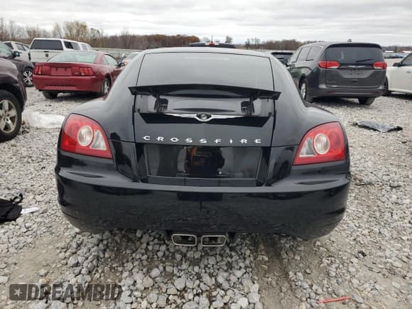 ✅ 2004 Chrysler Crossfire • VIN: 1C3AN69L74X002206 • Lot: 79107444. Listed on Copart with 99,937 mi. Free auction sales archive from the USA and detailed vehicle history report at DreamBid. Image 6.