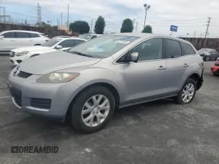✅ 2009 Mazda CX-7 Sport • VIN: JM3ER29L690221384 • Лот: 64701455. Опубликован ранее на Copart с пробегом 84 414 миль. Бесплатный доступ к архиву аукционных продаж из США и подробный отчёт об истории автомобиля на DreamBid. Изображение 1.