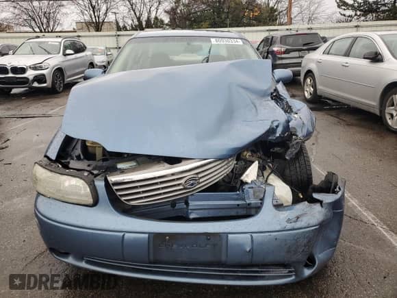 1999 Chevrolet Malibu LS z VIN 1G1NE52M9XY139570, wystawiony jako Copart lot #80930334 z przebiegiem 121 273 mil mil oraz Szkoda całkowita • Salvage title. Historia ofert i sprzedaży dostępna na DreamBid. Obrazek 5.