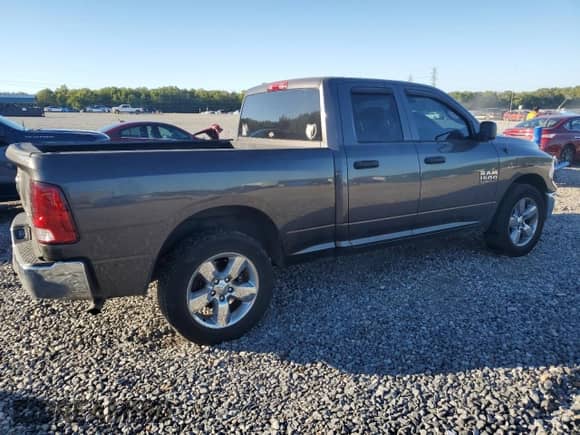 2019 Ram 1500 Tradesman with VIN 1C6RR7FG6KS519031, listed as a Copart auction lot 82232345 with 147,316 mi miles and Salvage title. Bid and sale history available at DreamBid. Image 3.