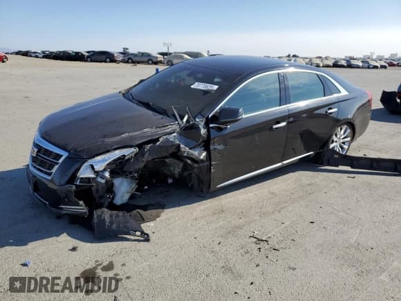 ✅ 2016 Cadillac XTS Luxury Collection • VIN: 2G61M5S36G9151599 • Lot: 70778835. Listed on Copart with 143,653 mi. Free auction sales archive from the USA and detailed vehicle history report at DreamBid. Image 1.