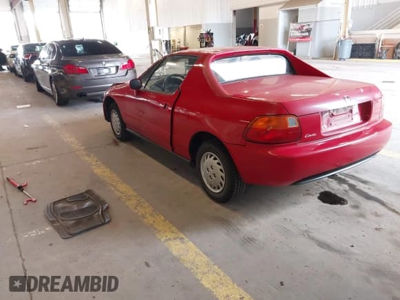 ✅ 1994 Honda del Sol S • VIN: JHMEG1140RS005031 • Лот: 42261794. Опубликован ранее на IAAI с пробегом 112 498 миль. Бесплатный доступ к архиву аукционных продаж из США и подробный отчёт об истории автомобиля на DreamBid. Изображение 3.