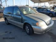 ✅ 2003 Kia Sedona LX • VIN: KNDUP131336372523 • Lot: 43528599. Listed on IAAI with 102,148 mi. Free auction sales archive from the USA and detailed vehicle history report at DreamBid. Image 1.