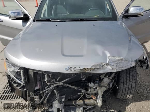 2014 Jeep Grand Cherokee Limited с VIN 1C4RJFBG7EC534037, выставлен на аукционе Copart как лот 72049055 с пробегом 103 233 миль миль и Списание • Salvage title. История ставок и продаж доступна на DreamBid. Изображение 12.