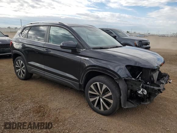 ✅ 2023 Volkswagen Taos SE • VIN: 3VVNX7B2XPM346932 • Лот: 65719945. Опубликован ранее на Copart с пробегом 42 085 миль. Бесплатный доступ к архиву аукционных продаж из США и подробный отчёт об истории автомобиля на DreamBid. Изображение 4.