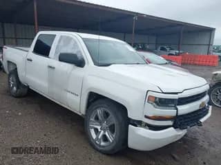2018 Chevrolet Silverado 1500 Custom z VIN 3GCUKPECXJG582189, wystawiony jako IAAI lot #42476800 z przebiegiem Nie podano mil oraz . Historia ofert i sprzedaży dostępna na DreamBid. Obrazek 1.