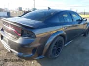 ✅ 2021 Dodge Charger Scat Pack Widebody • VIN: 2C3CDXGJXMH537859 • Lot: 41639612. Wystawiony na IAAI z przebiegiem 48 688 mil. Bezpłatny archiwum sprzedaży aukcyjnych z USA i szczegółowy raport historii pojazdu na DreamBid. Zdjęcie 4.