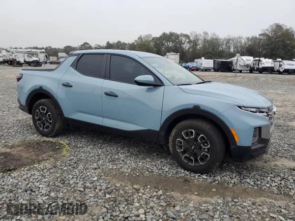 2024 Hyundai Santa Cruz SEL z VIN 5NTJBDDE3RH101529, wystawiony jako Copart lot #79864154 z przebiegiem 2 272 mil mil oraz Szkoda całkowita • Salvage title. Historia ofert i sprzedaży dostępna na DreamBid. Obrazek 4.