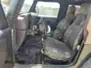 2005 Jeep Wrangler X с VIN 1J4FA39S45P319326, выставлен на аукционе Copart как лот 64983495 с пробегом 156 551 миль миль и Списание • Salvage title. История ставок и продаж доступна на DreamBid. Изображение 7.