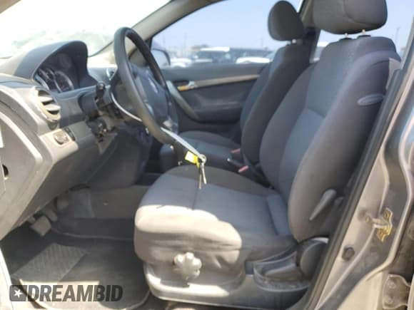 ✅ 2007 Chevrolet Aveo LT • VIN: KL1TG56607B053675 • Lot: 58504415. Wystawiony na Copart z przebiegiem 214 019 mil. Bezpłatny archiwum sprzedaży aukcyjnych z USA i szczegółowy raport historii pojazdu na DreamBid. Zdjęcie 7.